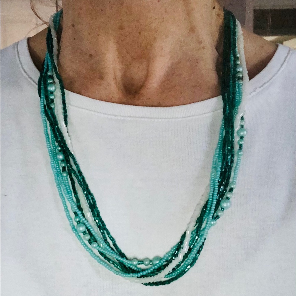Handmade 7 strand beaded necklace in shades of green & white
